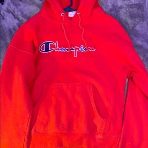 Woman’s Red Champion Hoodie W/ Logo